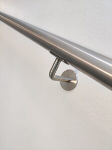 Metal handrails for concrete stairs